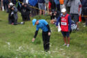 Rory McIlroy takes his drop after hitting out of bounds at the first during his 79 at Portrush.