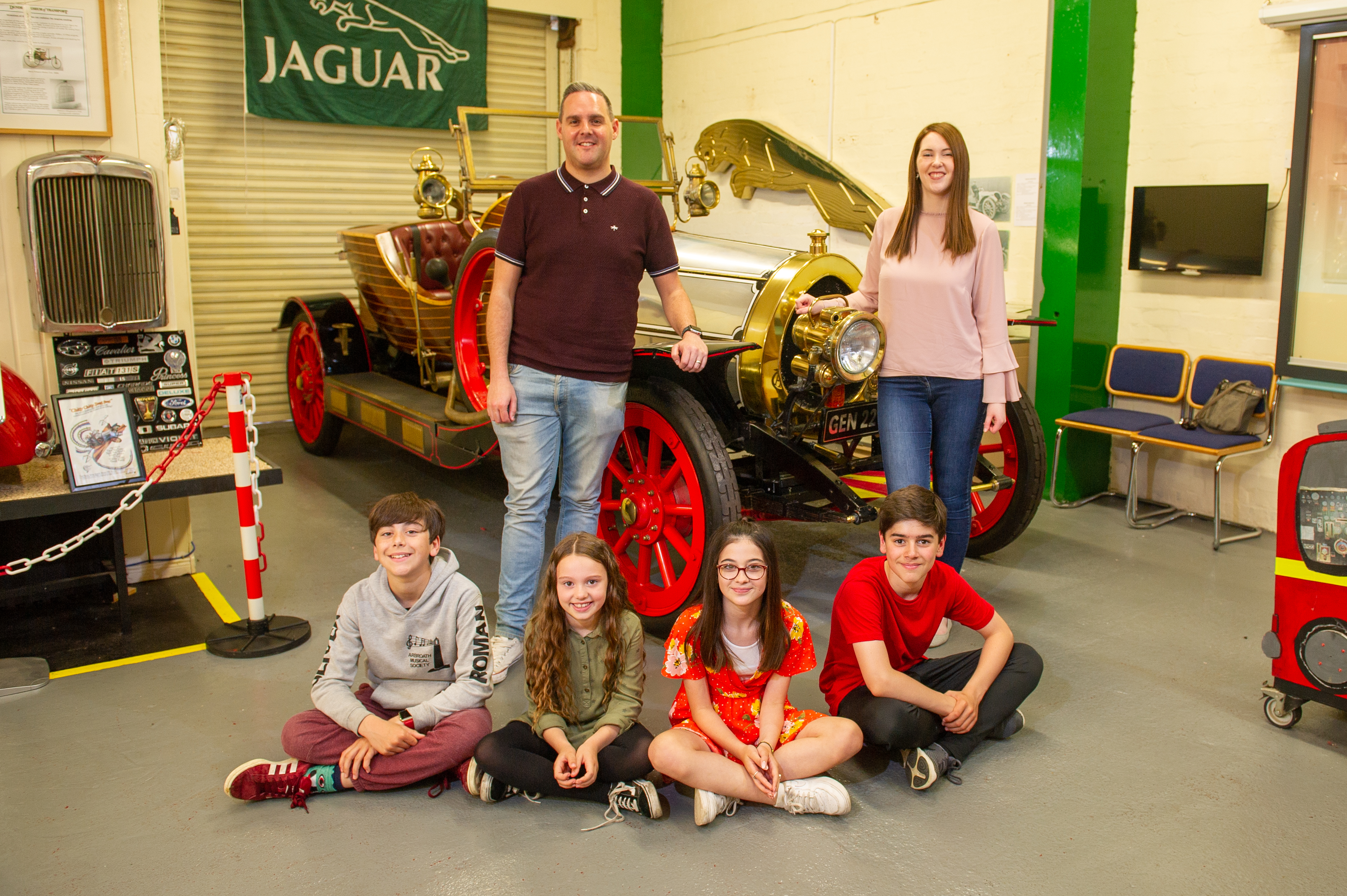 Principal actors in the forthcoming production pose alongside a replica car at Dundee Museum of Transport as they await their own five-figure prop's arrival.