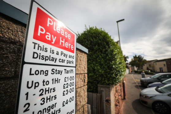 Charges in Angus car parks will remain suspended until the end of March.