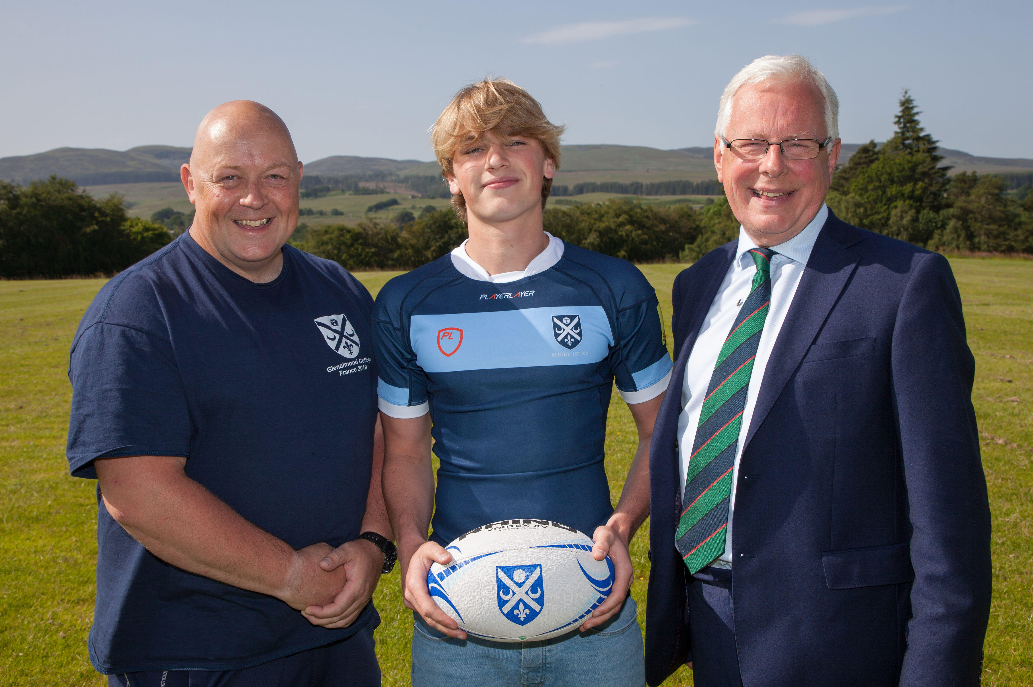Glenalmond director of sport Graham Smith, first Xv catain Tom Porter and Warden Hugh Ouston.
