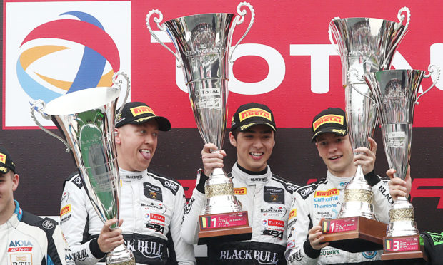 Sandy Mitchell (right) celebrates victory on the Spa podium in 2019.