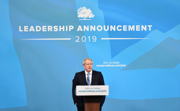 Boris Johnson speaks at the Queen Elizabeth II Centre in London after being announced as the new Conservative party leader and his transition to become the next Prime Minister.