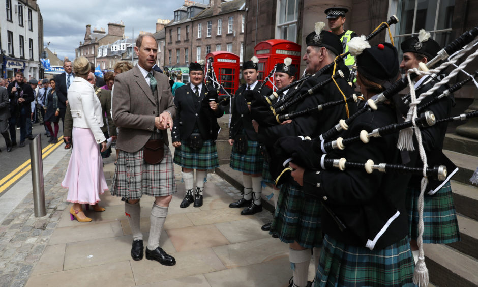 The Earl and Countess of Forfar chat with locals in Castle Street in Forfar.