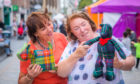 Erica Ritch (right from Broughty Ferry) alongside friend Maggie Nicol (left, from Brechin); Erica runs 'Ritch Pickings' and makes gifts from off cuts of tartan that she then sells, with the proceeds going to Great Ormond Street.