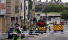 Emergency services on Holyrood Road at the scene of the fire.