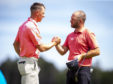 Scotland's Grant Forrest and Andy Sullivan shake hands after their round in the Scottish Open.