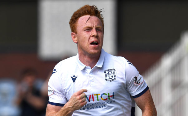 Danny Johnson after grabbing Dundee's winner.