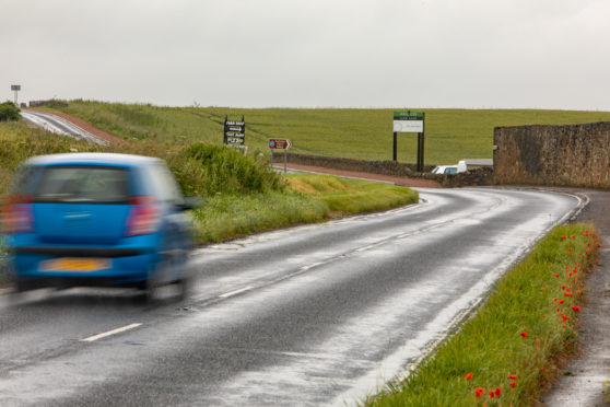 Scott Walker, 43, was found lying on the A917 between Elie and St Monans.