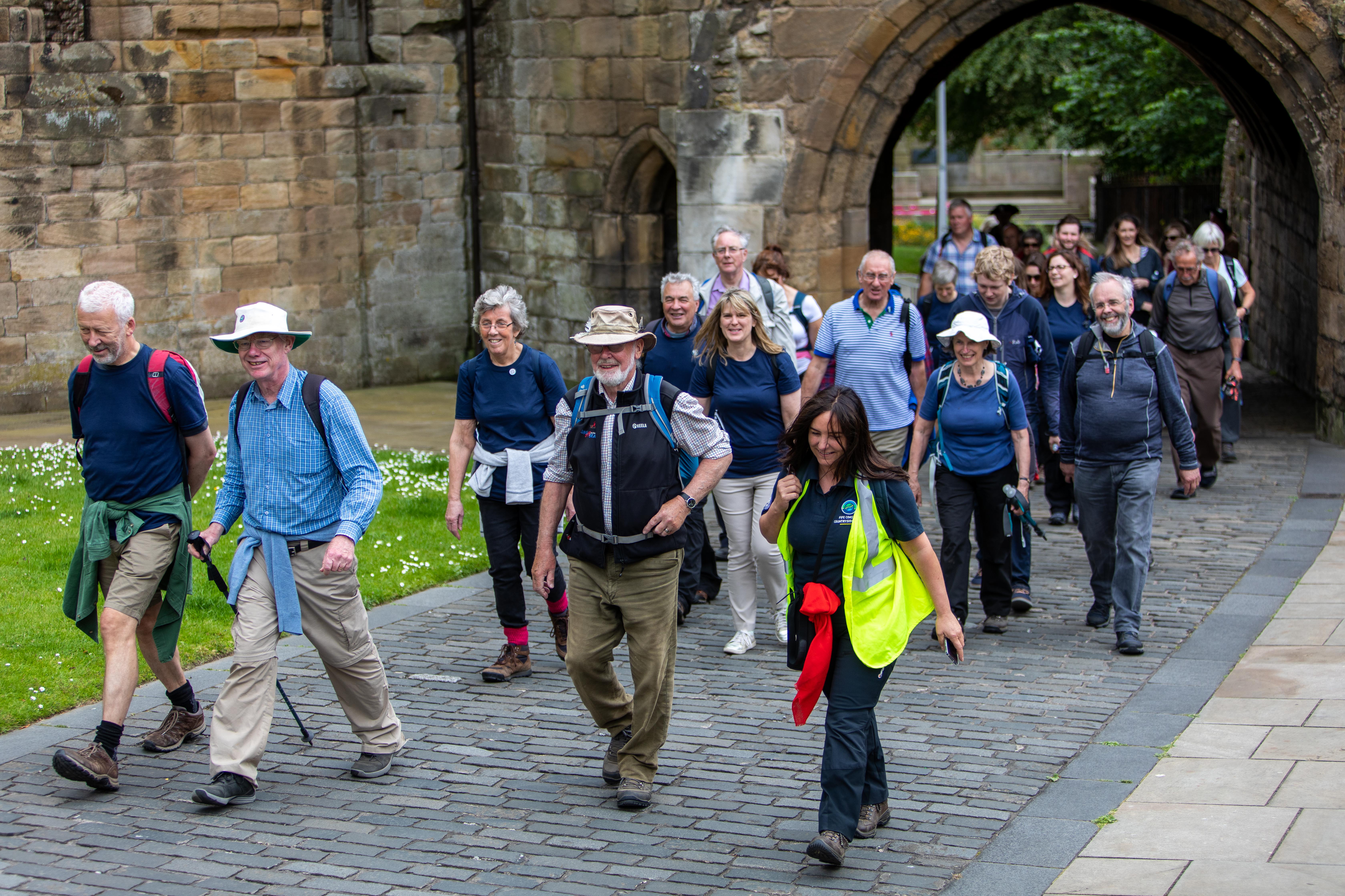 Walkers make their way on a special 8.5-mile section of the Pilgrim Way as part of the official opening day. Some donned costumes to mark to occasion.