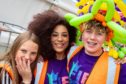 Volunteers Nicole Allan (13), Megan Hall (16) and Arron Kennedy (13) all colourful at Pride in Kirkcaldy.