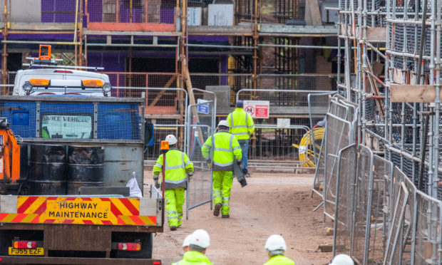 Work crews at the Lathro Farm site