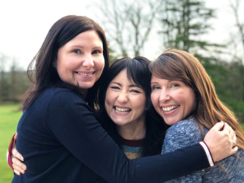 Pictured: Searcher KT Tunstall (centre) with found sisters Siobhan (L) and  Lesley-Anne (R).