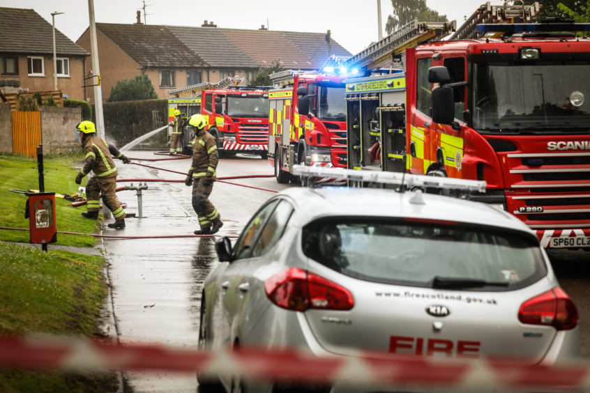 Fie crews on the scene of a fire at the Red Chilli takeaway in Fintry, Dundee