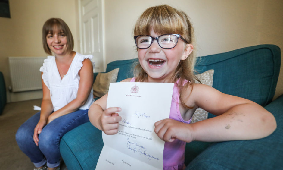 Four year Natasha Ord sent a thank you card to Her Majesty The Queen thanking her for awarding her grandad a BEM in the birthday honours. She was over the moon when she got a thank you letter on behalf of The Queen, sent by a Lady in Waiting at Buckingham Palace. 
Picture by Mhairi Edwards / DCT Media