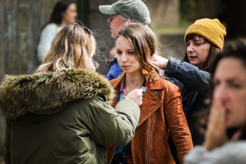 Molly Windsor on set during filming of Traces in Wellington Street, Dundee.