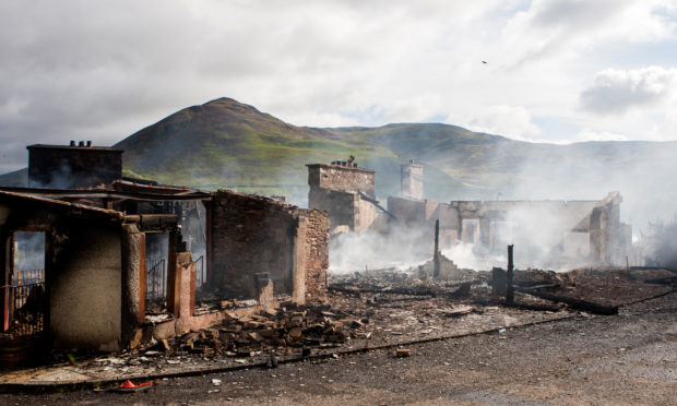 The smoulder ruins of Spittal of Glenshee Hotel.