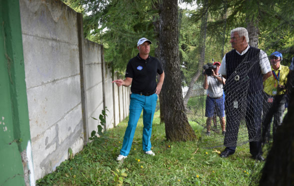 John Paramor (r), head referee of the European Tour, has been given stringent penalties to police slow play.