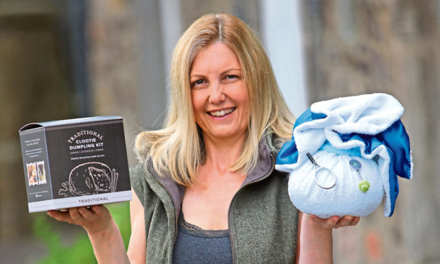 Clootie Mctoot founder Michelle Maddox with some of her company's products.