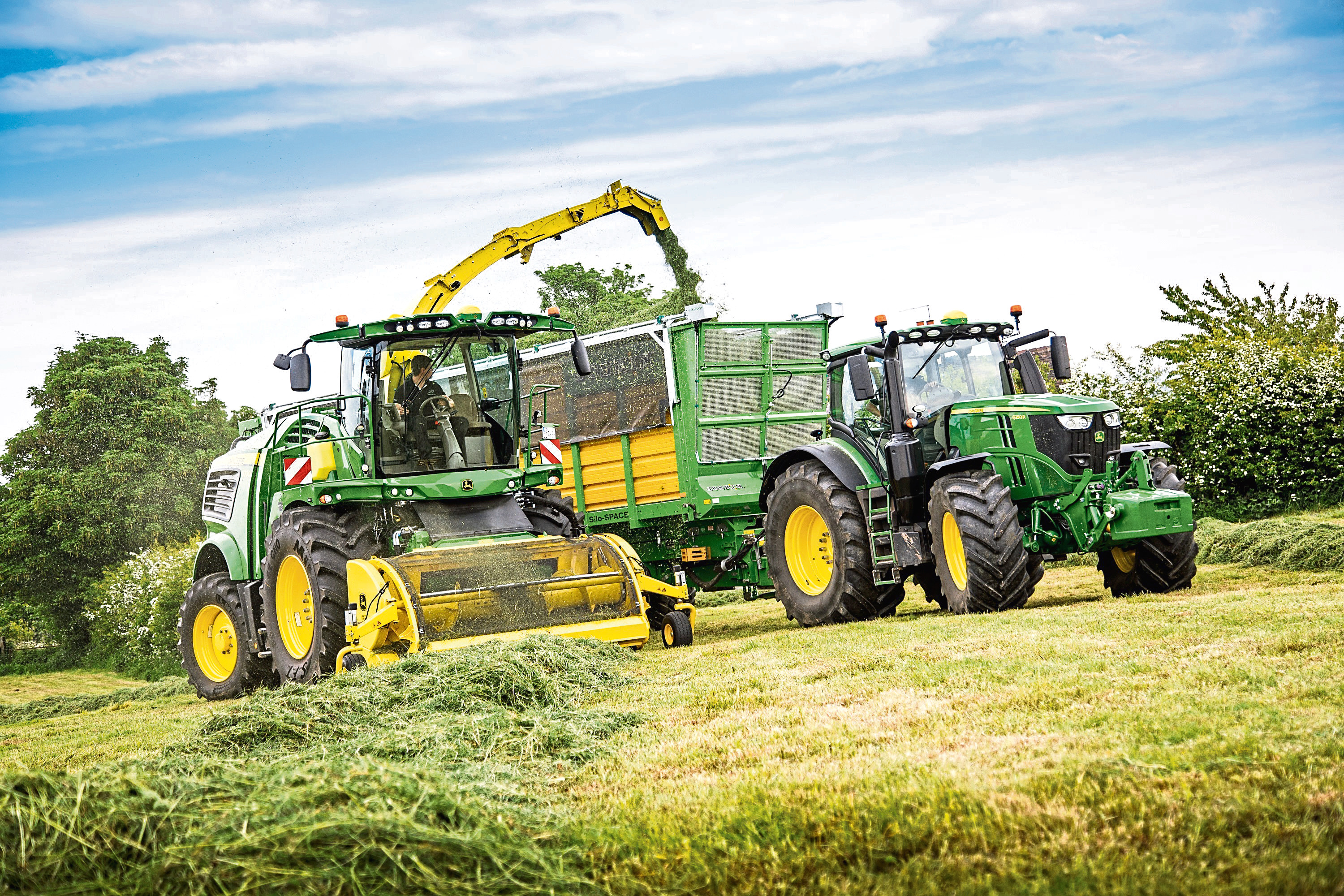 Scottish farmers are still thinking big with tractors like the John Deere 9700i SPFH .