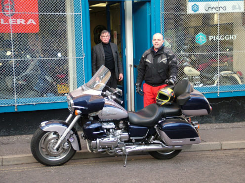 Andrew Hart in the doorway, with his sales manager Andrew Nixon.