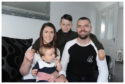 Shelly Friel with her sons Ollie, 10 months, James, 9, and partner James Clark.