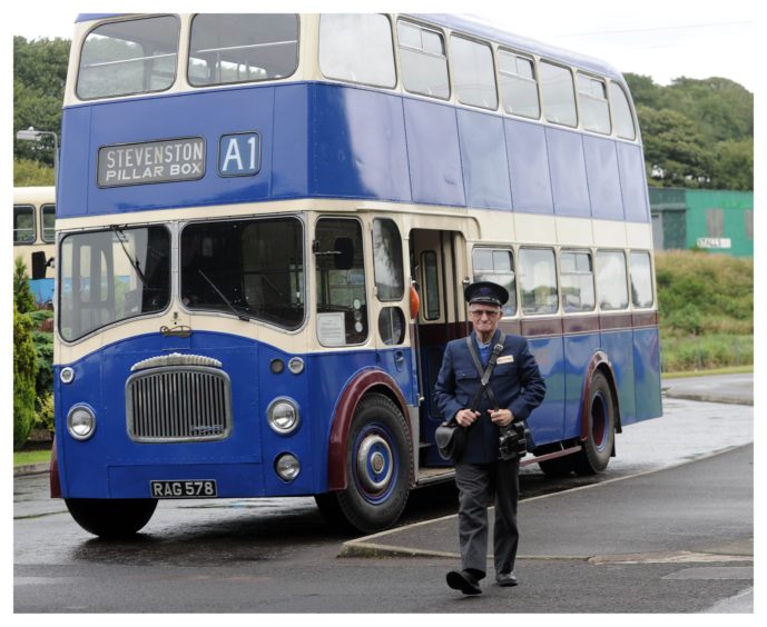 Conductor Sam Ramage ready to welcome visitors.