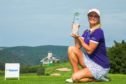 Carly Booth with the Czech Ladies Open trophy.