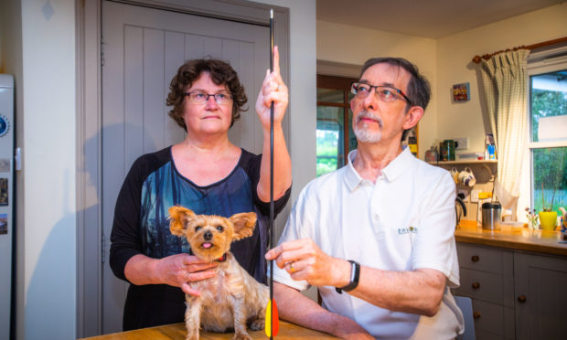 Joe, Pauline and dog Keira.