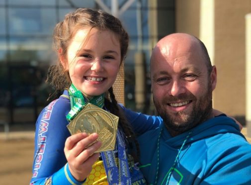 Cora with dad Jamie.