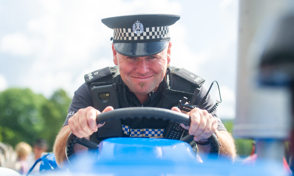 Community PC for Pitlochry, Jamie Elder and one of the vintage tractors.
All pictures by Kim Cessford / DCT Media