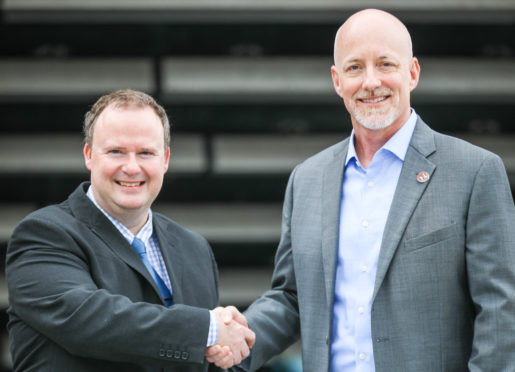 Ian Roache with United owner Mark Ogren.