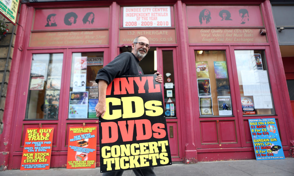 Alastair "Breeks" Brodie outside his shop Groucho's.