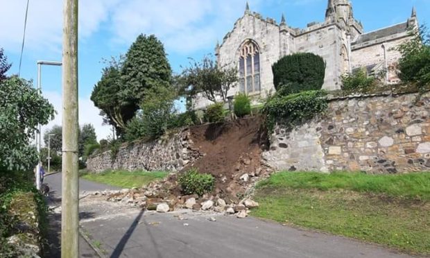 Damage caused to the church wall a year ago.