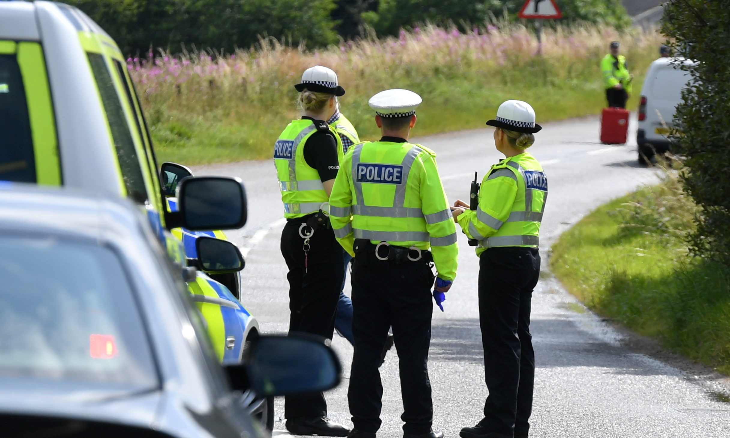 Police on the A97 near Kildrummy following the crash.