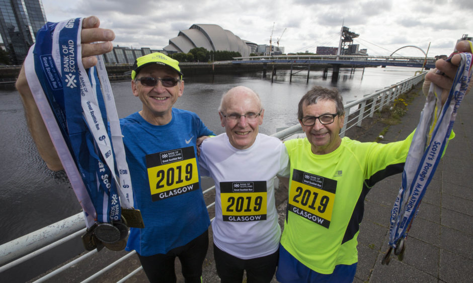 Runners Drew Riddell, Martin Caldwell and Stewart Jamieson at Glasgow’s Clydeside, to celebrate having run an amazing 101 Great Scottish Run events between them since 1984 and to look forward to this year’s Bank of Scotland Great Scottish Run, taking place on Saturday 28th and Sunday 29th September. The amateur runners from Glasgow have all taken part in the run without a break since the 1980s, clocking up an incredible 2,130 kilometres between them.
