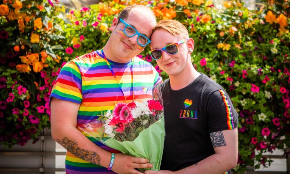 Danny Mitchell (left) proposed to Josh Ogilvie at the event.