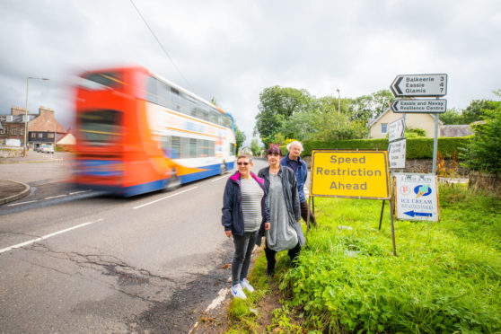 New 40mph buffer zones have been agreed for Angus communities. Pic shows Pat Small and Dudley Trefry of Newtyle and Eassie Community Council with Angus Cllr Julie Bell (centre).