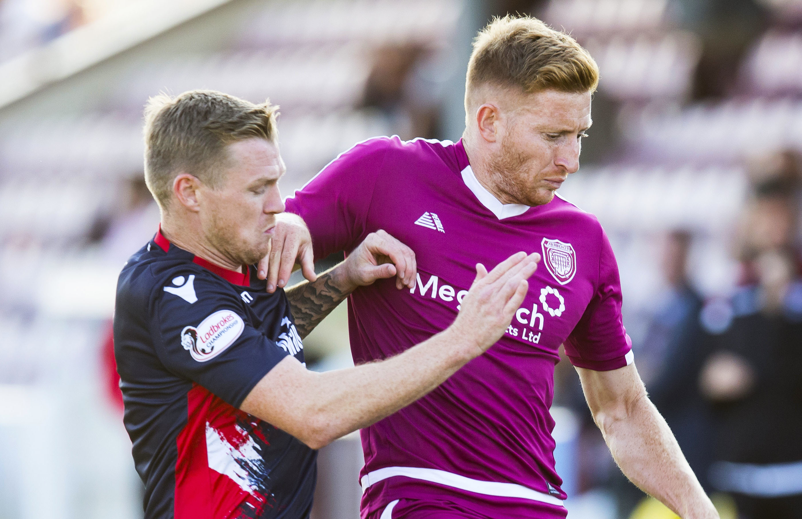 Jason Thomson, right, in action for Arbroath.