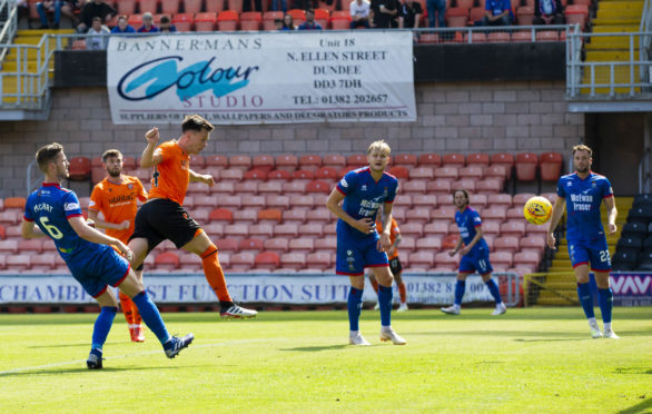 Dundee United's Lawrence Shankland scores the opener.