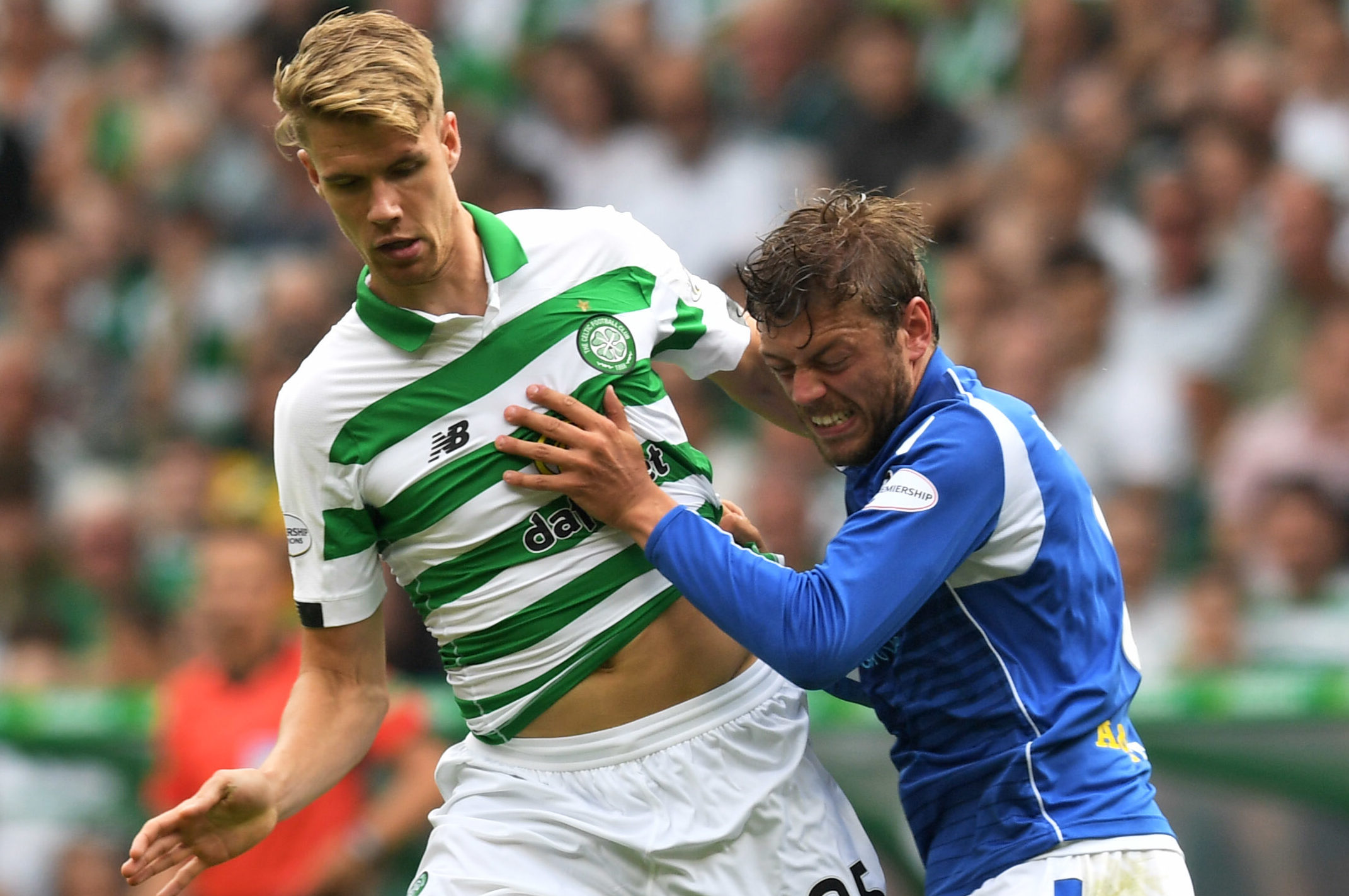 Celtic's Kris Ajer and Murray Davidson in action.