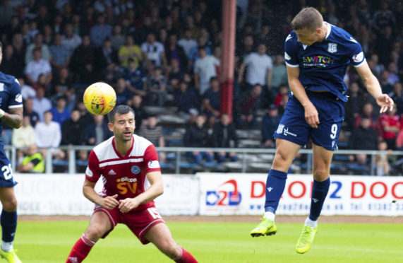 Andrew Nelson scoring with his header.