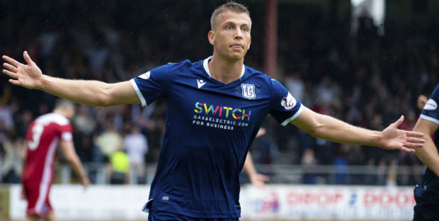 Andrew Nelson celebrates a goal for Dundee last season.