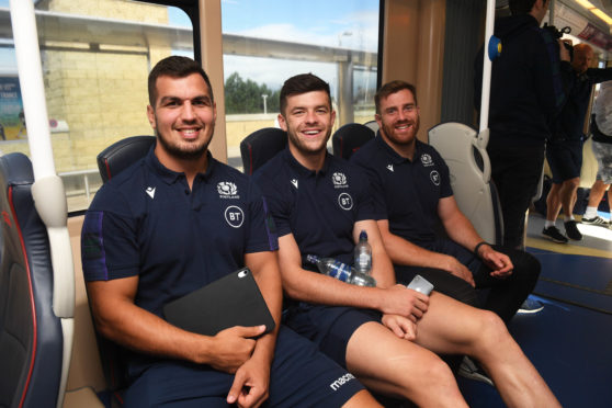 The Scotland team took the tram from Murrayfield to Edinigrh Airport on their way to Nice. (L to r) Skipper Stuart McInally, Blair Kinghorn and Simon Berghan take their seats.