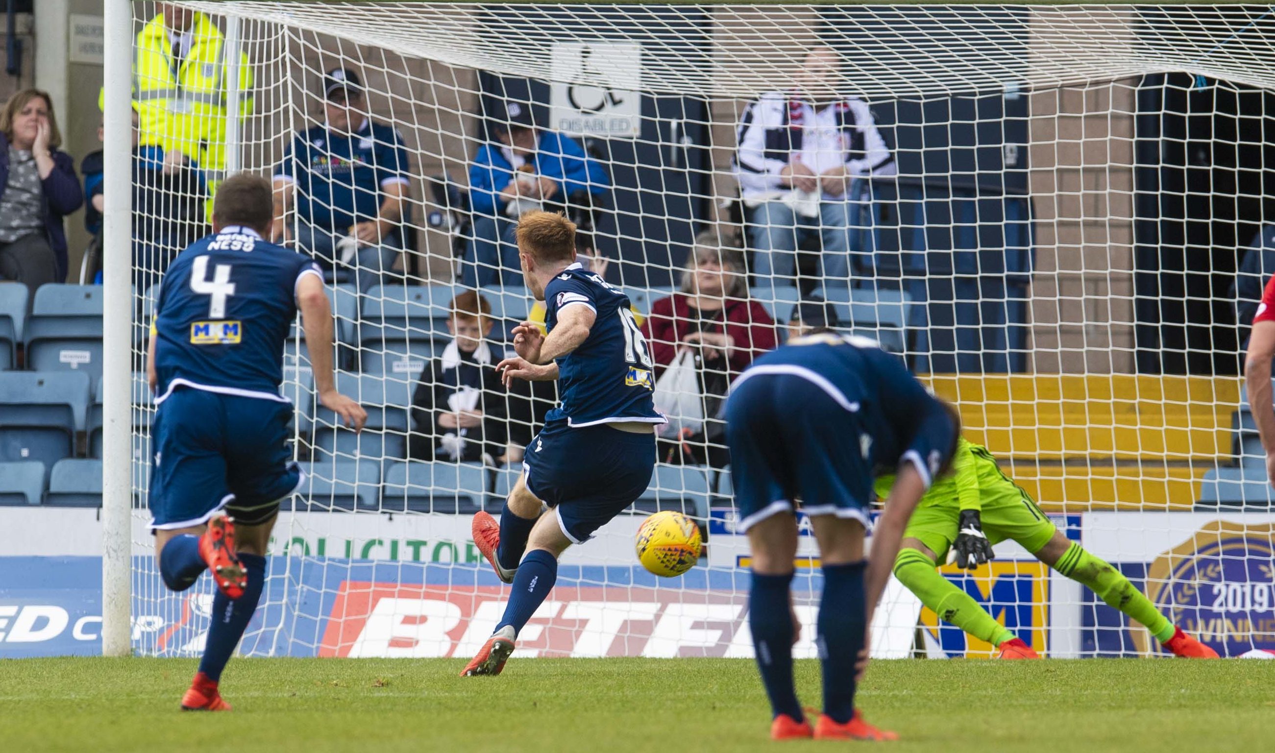 Danny Johnson scores from the spot for Dundee.