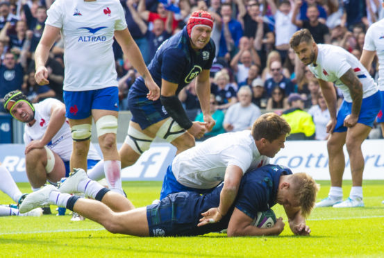 Chris Harris scores the key try as Scotland play France at Murrayfield in August.