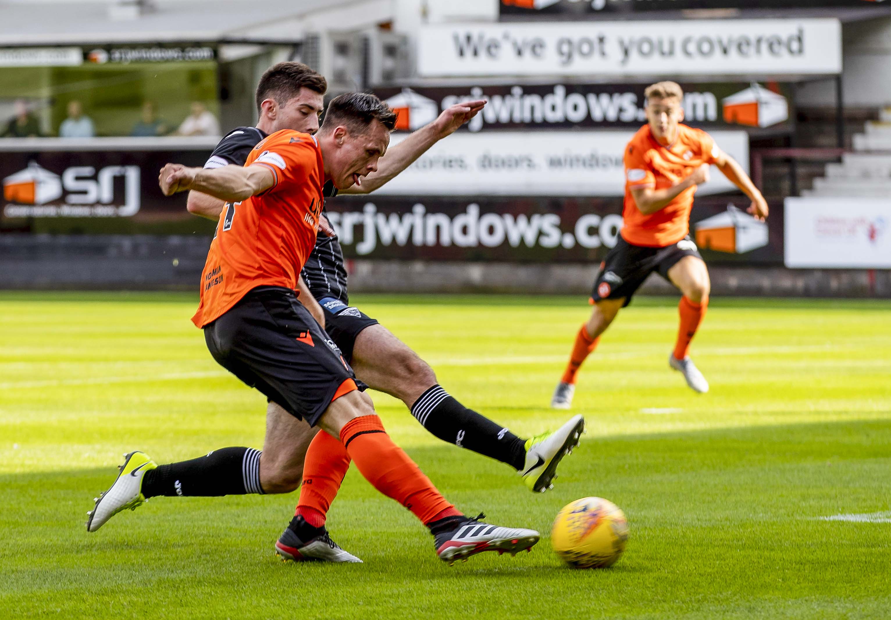 Lawrence Shankland fires in his first goal.