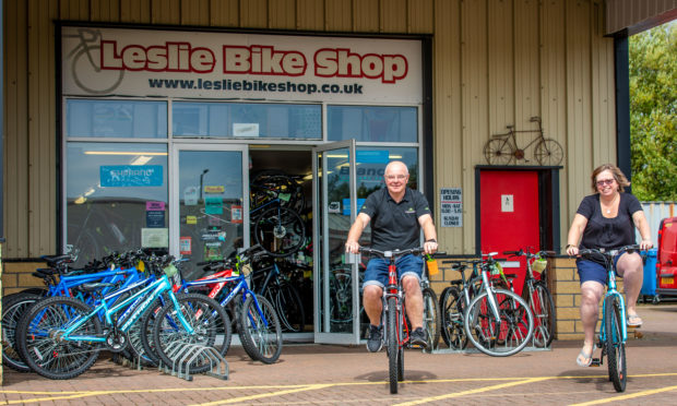 Previous owners Andy and Fiona Hain outside the shop in Glenrothes.