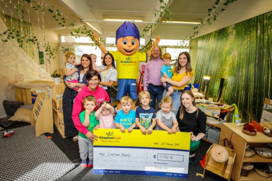 Linktown Nursery in Kirkcaldy was awarded £5080 in goods for the nursery. Staff and kids who use the service along with Kingdom Kids Mascot.