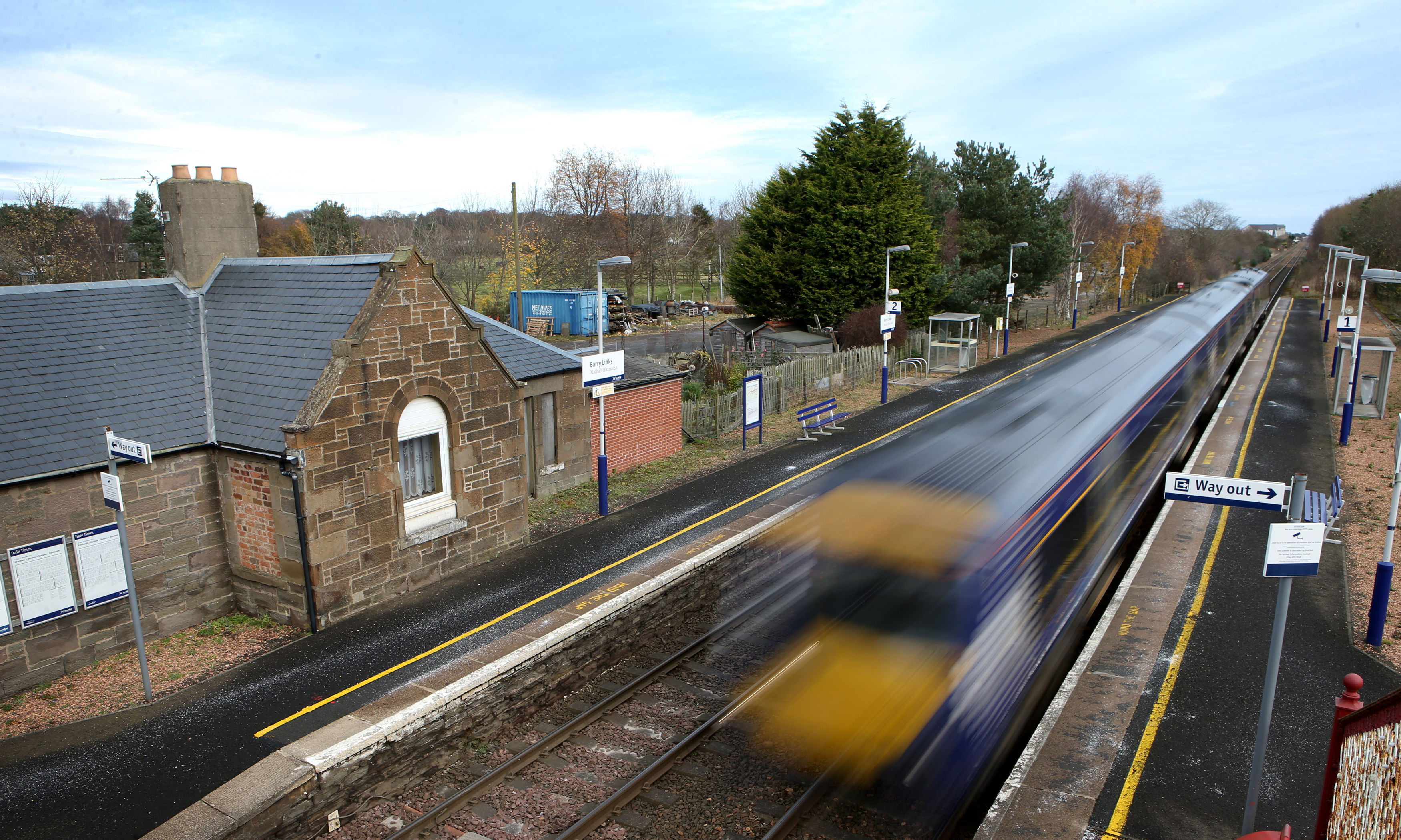 A train passes through Barry Links railway station near Carnoustie.