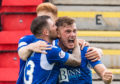 Callum Hendry celebrates his goal against Livingston.